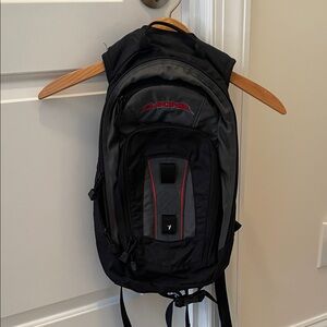 Dakine Black Backpack with Red Details